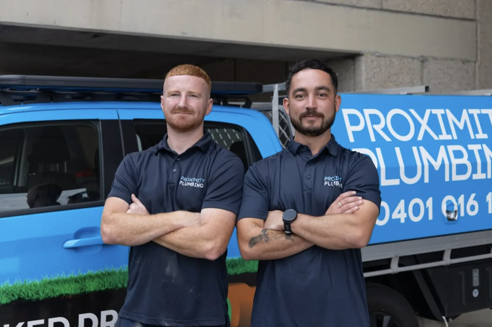 Two licensed local plumbers at the service van